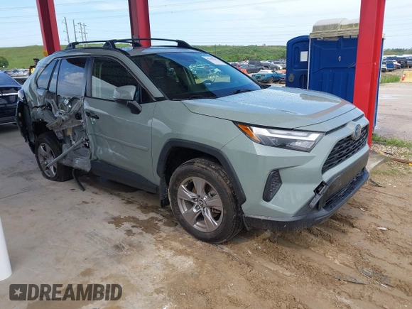 2022 Toyota RAV4 Hybrid XLE with VIN JTMRWRFV9NJ054668, listed as a IAAI auction lot 42606261 with 61,794 mi miles and . Bid and sale history available at DreamBid. Image 1.