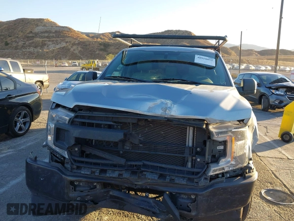 2020 Ford F-150 XL with VIN 1FTMF1CB6LKD12187, listed as a IAAI auction lot 40918052 with 111,570 mi miles and . Bid and sale history available at carsss.com. Image 12.
