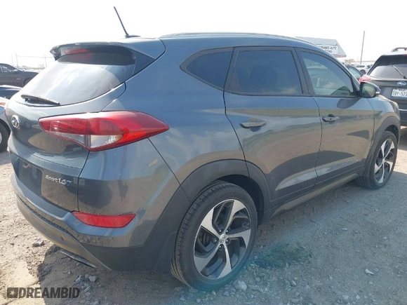 2016 Hyundai Tucson Limited with VIN KM8J33A29GU148840, listed as a IAAI auction lot 42064605 with 119,186 mi miles. Bid and sale history available at carsss.com. Image 4.