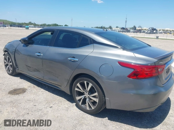 2016 Nissan Maxima SL with VIN 1N4AA6AP9GC901494, listed as a IAAI auction lot 42023106 with 160,581 mi miles and . Bid and sale history available at DreamBid. Image 3.