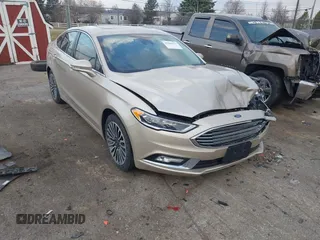 2018 Ford Fusion Titanium with VIN 3FA6P0K90JR108157, listed as a IAAI auction lot 41901575 with 140,204 mi miles and . Bid and sale history available at DreamBid. Image 1.