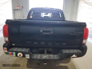 2019 Toyota Tacoma 4WD SR with VIN 5TFCZ5AN5KX185683, listed as a Copart auction lot 54176255 with 106,524 mi miles and Clean Title. Bid and sale history available at carsss.com. Image 6.