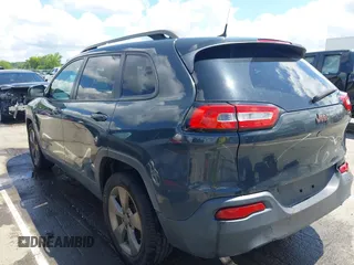 2016 Jeep Cherokee Latitude with VIN 1C4PJLCBXGW284156, listed as a IAAI auction lot 42264152 with 117,327 mi miles and . Bid and sale history available at DreamBid. Image 3.