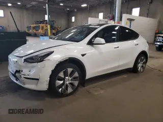 2023 Tesla Model Y Long Range z VIN 7SAYGDEE5PA067389, wystawiony jako Copart lot #54109625 z przebiegiem 24 849 mil mil oraz Szkody całkowita. Historia ofert i sprzedaży dostępna na DreamBid. Obrazek 1.