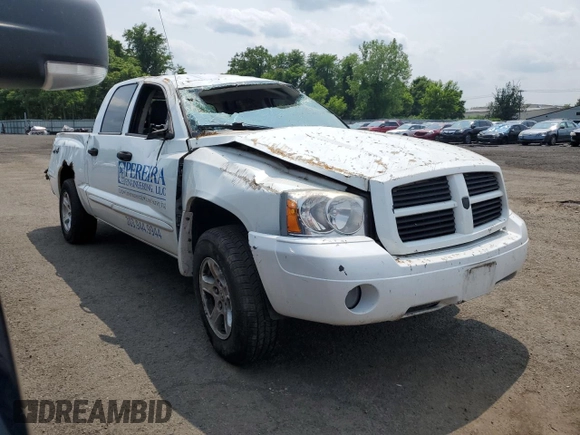 2006 Dodge Dakota SLT z VIN 1D7HW48N76S671886, wystawiony jako Copart lot #59487655 z przebiegiem Nie podano mil oraz Szkoda całkowita • Salvage title. Historia ofert i sprzedaży dostępna na DreamBid. Obrazek 4.