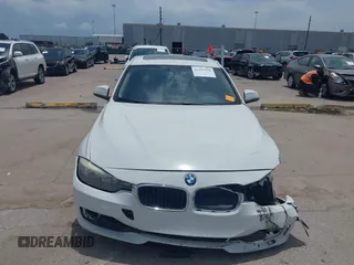 2013 BMW 3 Series 320i with VIN WBA3B1C50DK129576, listed as a IAAI auction lot 42393038 with 160,370 mi miles and . Bid and sale history available at DreamBid. Image 12.