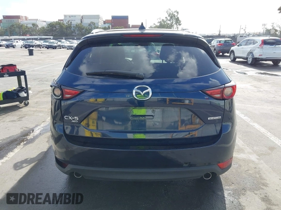 2021 Mazda CX-5 Grand Touring with VIN JM3KFBDM6M1312573, listed as a IAAI auction lot 41936739 with Not Provided miles and . Bid and sale history available at DreamBid. Image 15.