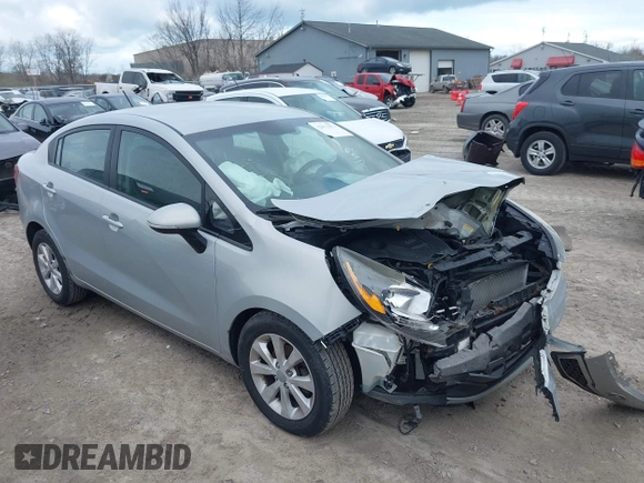 2014 Kia Rio EX with VIN KNADN4A36E6338670, listed as a IAAI auction lot 42035501 with 166,561 mi miles. Bid and sale history available at carsss.com. Image 1.