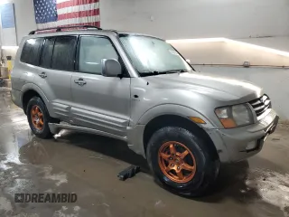 2001 Mitsubishi Montero Limited z VIN JA4MW51R71J038583, wystawiony jako Copart lot #83024384 z przebiegiem 157 538 mil mil oraz Szkoda całkowita • Salvage title. Historia ofert i sprzedaży dostępna na DreamBid. Obrazek 4.
