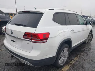 2019 Volkswagen Atlas SE z VIN 1V2WR2CA8KC504134, wystawiony jako IAAI lot #41700050 z przebiegiem 97 047 mil mil oraz . Historia ofert i sprzedaży dostępna na DreamBid. Obrazek 4.