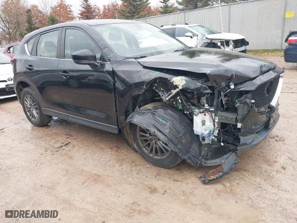 2017 Mazda CX-5 Sport with VIN JM3KFBBL5H0201857, listed as a IAAI auction lot 40885161 with 87,464 mi miles. Bid and sale history available at carsss.com. Image 1.