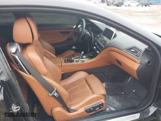 2014 BMW M6 with VIN WBSLX9C58ED160558, listed as a IAAI auction lot 41553209 with 154,789 mi miles. Bid and sale history available at carsss.com. Image 5.