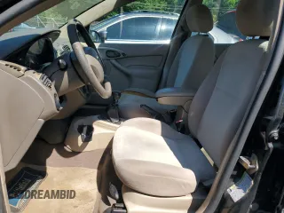 2004 Ford Focus ZTW with VIN 1FAFP35Z84W203676, listed as a Copart auction lot 57272835 with 183,115 mi miles and Salvage title. Bid and sale history available at DreamBid. Image 7.