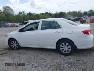 2013 Toyota Corolla L with VIN 2T1BU4EE1DC933653, listed as a IAAI auction lot 41964689 with 68,171 mi miles and . Bid and sale history available at DreamBid. Image 14.