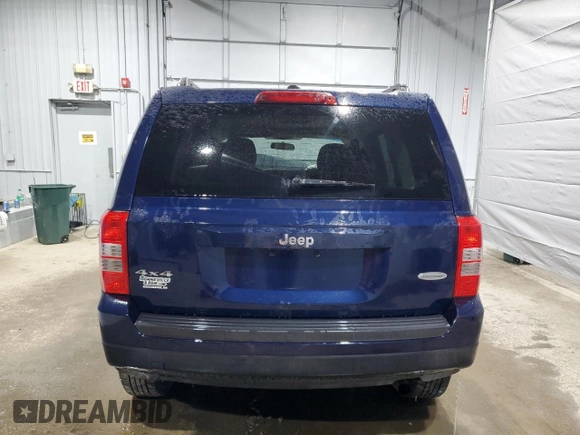 2014 Jeep Patriot Latitude with VIN 1C4NJRFB0ED852882, listed as a Copart auction lot 49674915 with 130,367 mi miles and Salvage title. Bid and sale history available at DreamBid. Image 6.