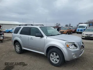 2010 Mercury Mariner z VIN 4M2CN9B75AKJ24200, wystawiony jako Copart lot #49974115 z przebiegiem 211 348 mil mil oraz Szkoda całkowita • Salvage title. Historia ofert i sprzedaży dostępna na DreamBid. Obrazek 4.