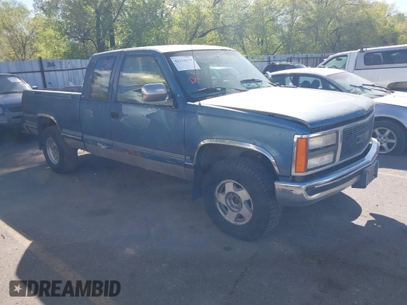 1992 GMC Sierra 1500 z VIN 2GTEK19K1N1520018, wystawiony jako IAAI lot #42116679 z przebiegiem 239 658 mil mil oraz . Historia ofert i sprzedaży dostępna na DreamBid. Obrazek 1.
