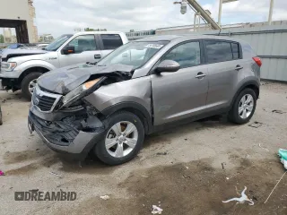 2013 Kia Sportage LX z VIN KNDPB3A22D7421290, wystawiony jako Copart lot #54708605 z przebiegiem 94 893 mil mil oraz Szkoda całkowita • Salvage title. Historia ofert i sprzedaży dostępna na DreamBid. Obrazek 1.