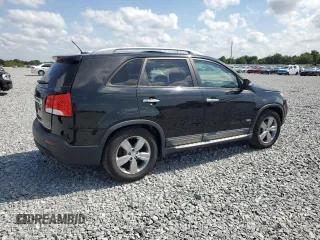 2012 Kia Sorento EX z VIN 5XYKUDA25CG305111, wystawiony jako Copart lot #54216645 z przebiegiem 111 841 mil mil oraz Szkoda całkowita • Salvage title. Historia ofert i sprzedaży dostępna na DreamBid. Obrazek 3.