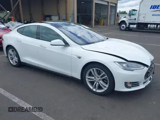 2016 Tesla Model S 90D with VIN 5YJSA1E21GF121962, listed as a IAAI auction lot 42130291 with 114,670 mi miles and . Bid and sale history available at DreamBid. Image 1.
