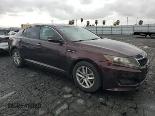 2011 Kia Optima LX z VIN KNAGM4A72B5116910, wystawiony jako Copart lot #55839845 z przebiegiem 187 943 mil mil oraz Szkoda całkowita • Salvage title. Historia ofert i sprzedaży dostępna na DreamBid. Obrazek 4.
