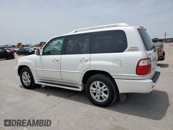 2004 Lexus LX 470 z VIN JTJHT00W743542910, wystawiony jako Copart lot #57187445 z przebiegiem 236 985 mil mil oraz Szkoda całkowita • Salvage title. Historia ofert i sprzedaży dostępna na DreamBid. Obrazek 2.