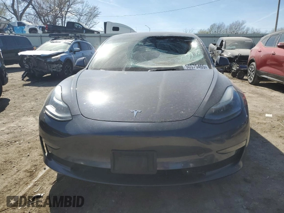 2021 Tesla Model 3 Standard Range Plus z VIN 5YJ3E1EA0MF089307, wystawiony jako Copart lot #50575465 z przebiegiem 131 251 mil mil oraz Szkody całkowita. Historia ofert i sprzedaży dostępna na DreamBid. Obrazek 5.