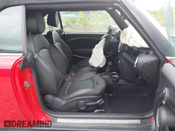 2014 MINI Convertible S с VIN WMWZP3C52ET706272, выставлен на аукционе IAAI как лот 42198277 с пробегом 40 372 миль миль и . История ставок и продаж доступна на DreamBid. Изображение 5.