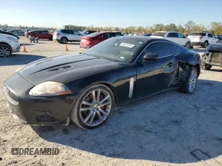 2008 Jaguar XK with VIN SAJWA43C689B24998, listed as a Copart auction lot 84232444 with 187,416 mi miles and Salvage Title. Bid and sale history available at carsss.com. Image 1.