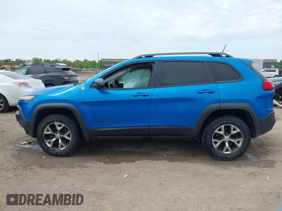2017 Jeep Cherokee Trailhawk with VIN 1C4PJMBS2HW612792, listed as a IAAI auction lot 42373828 with 74,106 mi miles and . Bid and sale history available at DreamBid. Image 14.