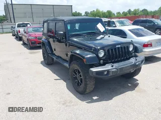 2015 Jeep Wrangler Unlimited Sahara with VIN 1C4HJWEG6FL572674, listed as a IAAI auction lot 42736266 with 97,024 mi miles and . Bid and sale history available at DreamBid. Image 1.