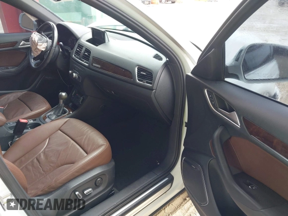 2017 Audi Q3 Prestige z VIN WA1GCCFS1HR005371, wystawiony jako IAAI lot #41991188 z przebiegiem 86 380 mil mil oraz . Historia ofert i sprzedaży dostępna na DreamBid. Obrazek 5.