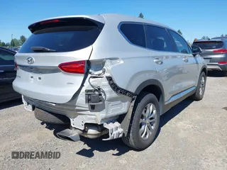 2019 Hyundai Santa Fe SE with VIN 5NMS2CAD9KH122140, listed as a IAAI auction lot 42616171 with 50,794 mi miles and . Bid and sale history available at DreamBid. Image 4.