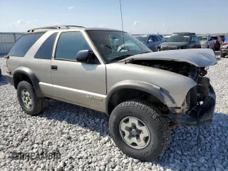 2001 Chevrolet Blazer LS z VIN 1GNCT18W71K130129, wystawiony jako Copart lot #85113764 z przebiegiem 65 992 mil mil oraz Czysty tytuł • Clean title. Historia ofert i sprzedaży dostępna na DreamBid. Obrazek 4.