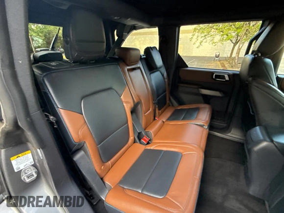 2022 Ford Bronco with VIN 1FMEE5DP5NLB24049, listed as a Copart auction lot 56769875 with 20,710 mi miles and Salvage Title. Bid and sale history available at DreamBid. Image 6.