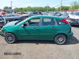 2002 Ford Focus ZX5 z VIN 3FAFP373X2R130965, wystawiony jako IAAI lot #42216638 z przebiegiem 59 236 mil mil oraz . Historia ofert i sprzedaży dostępna na DreamBid. Obrazek 14.