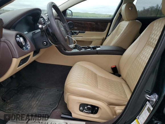 2018 Jaguar XJ Portfolio with VIN SAJWJ2GD9J8W15663, listed as a Copart auction lot 56734515 with 9,374 mi miles and Salvage Title. Bid and sale history available at DreamBid. Image 7.