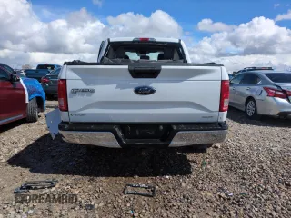 2015 Ford F-150 XLT with VIN 1FTEW1EF5FFB17148, listed as a Copart auction lot 51265215 with 128,011 mi miles and Salvage Title. Bid and sale history available at carsss.com. Image 6.