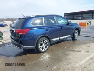 2016 Mitsubishi Outlander SE with VIN JA4AZ3A32GZ064867, listed as a IAAI auction lot 41599000 with 113,159 mi miles and . Bid and sale history available at DreamBid. Image 4.