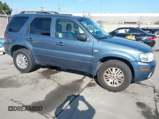 2005 Mercury Mariner Luxury z VIN 4M2CU57135DJ07230, wystawiony jako IAAI lot #41461657 z przebiegiem 267 105 mil mil oraz . Historia ofert i sprzedaży dostępna na DreamBid. Obrazek 1.