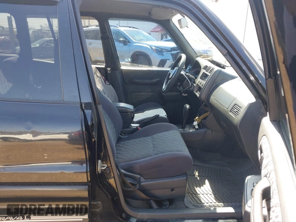 1999 Toyota RAV4 with VIN JT3GP10V9X7058089, listed as a IAAI auction lot 42040497 with 189,779 mi miles and . Bid and sale history available at DreamBid. Image 5.