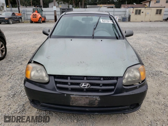 2004 Hyundai Accent GL with VIN KMHCG35C44U299645, listed as a Copart auction lot 63728174 with 159,604 mi miles and Clean Title. Bid and sale history available at carsss.com. Image 5.