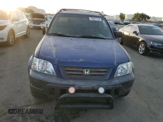 1999 Honda CR-V LX with VIN JHLRD1742XC066975, listed as a Copart auction lot 79447754 with 214,729 mi miles and Salvage Title. Bid and sale history available at carsss.com. Image 5.