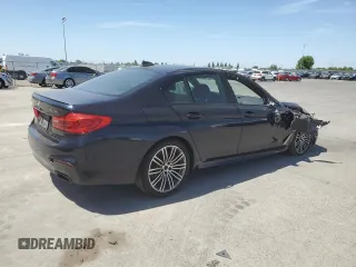 2019 BMW 5 Series M550i xDrive with VIN WBAJB9C5XKB287877, listed as a Copart auction lot 52994065 with 52,460 mi miles and Salvage title. Bid and sale history available at DreamBid. Image 3.