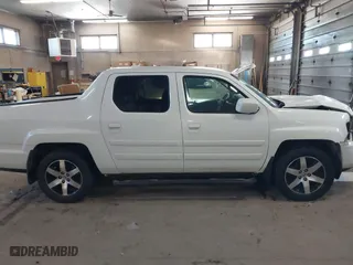 2014 Honda Ridgeline SE with VIN 5FPYK1F6XEB010582, listed as a IAAI auction lot 41641803 with 69,923 mi miles. Bid and sale history available at carsss.com. Image 13.