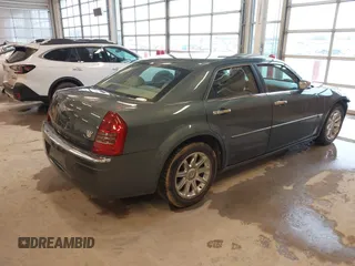 2005 Chrysler 300 with VIN 2C3JA63H95H111269, listed as a IAAI auction lot 41717805 with 102,740 mi miles. Bid and sale history available at carsss.com. Image 4.