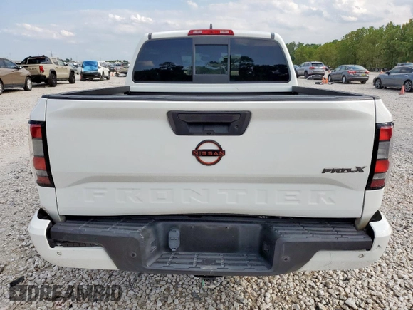 2022 Nissan Frontier SV with VIN 1N6ED1EJ6NN619016, listed as a Copart auction lot 58311855 with 56,943 mi miles and Clean title. Bid and sale history available at DreamBid. Image 6.