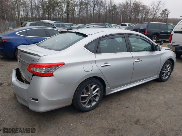 2014 Nissan Sentra S with VIN 3N1AB7AP9EL612519, listed as a IAAI auction lot 41799423 with 199,734 mi miles. Bid and sale history available at carsss.com. Image 4.