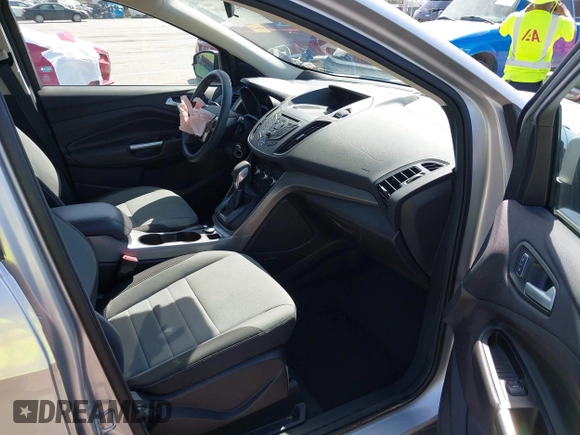 2016 Ford Escape SE with VIN 1FMCU9G98GUA10333, listed as a IAAI auction lot 42021490 with 128,973 mi miles. Bid and sale history available at carsss.com. Image 5.