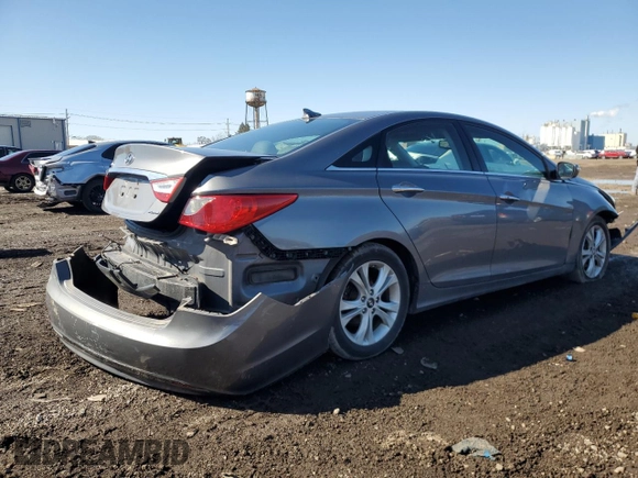 2013 Hyundai Sonata Limited with VIN 5NPEC4AC7DH658484, listed as a Copart auction lot 49443485 with 214,114 mi miles and Salvage Title. Bid and sale history available at DreamBid. Image 3.